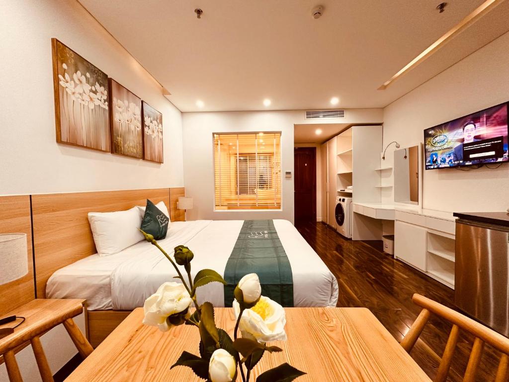 TV a/nebo společenská místnost v ubytování Rivera Suites