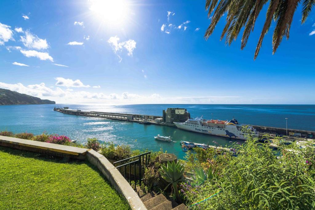 a cruise ship docked at a dock in the water at Pestana Casino Park Hotel & Casino in Funchal