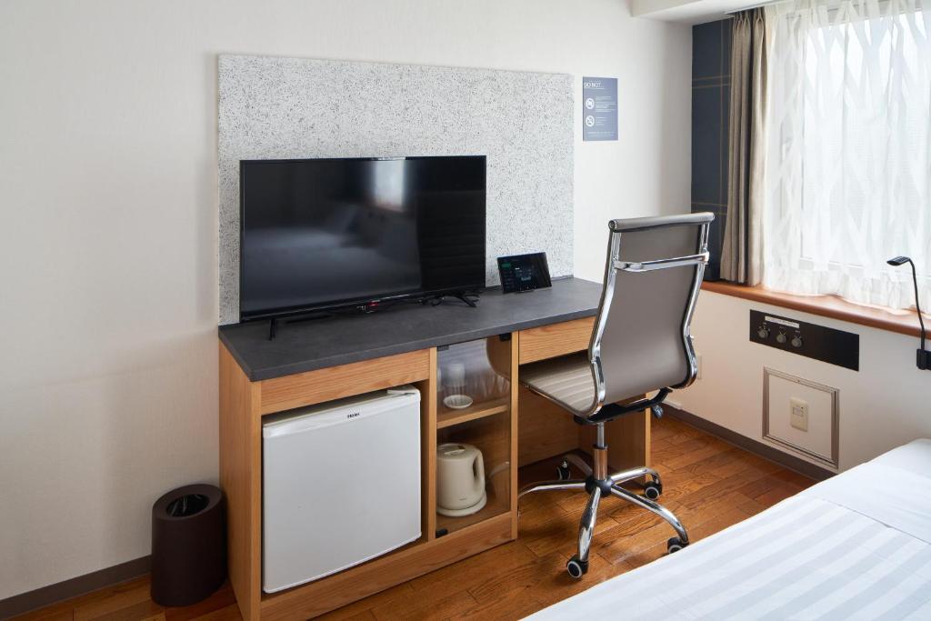 TV a/nebo společenská místnost v ubytování TOKIO's HOTEL