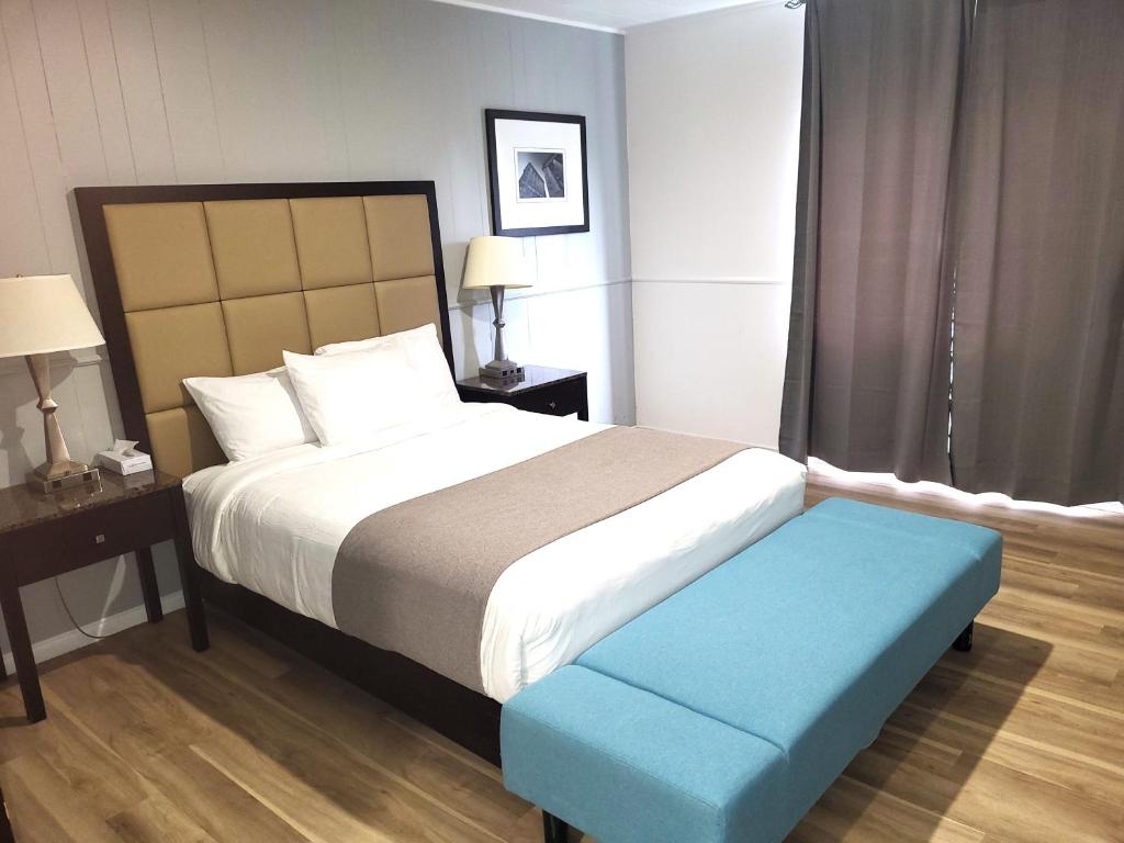 Postel nebo postele na pokoji v ubytování Hotel Sigma