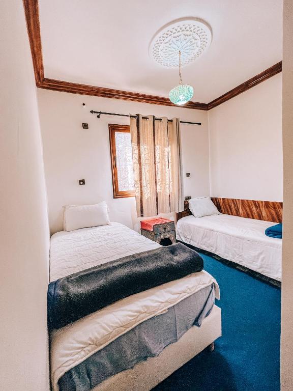 Postel nebo postele na pokoji v ubytování Gite Panorama