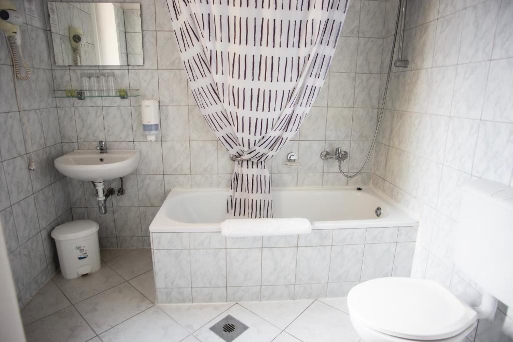 Kúpeľňa v ubytovaní Hotel Kapos