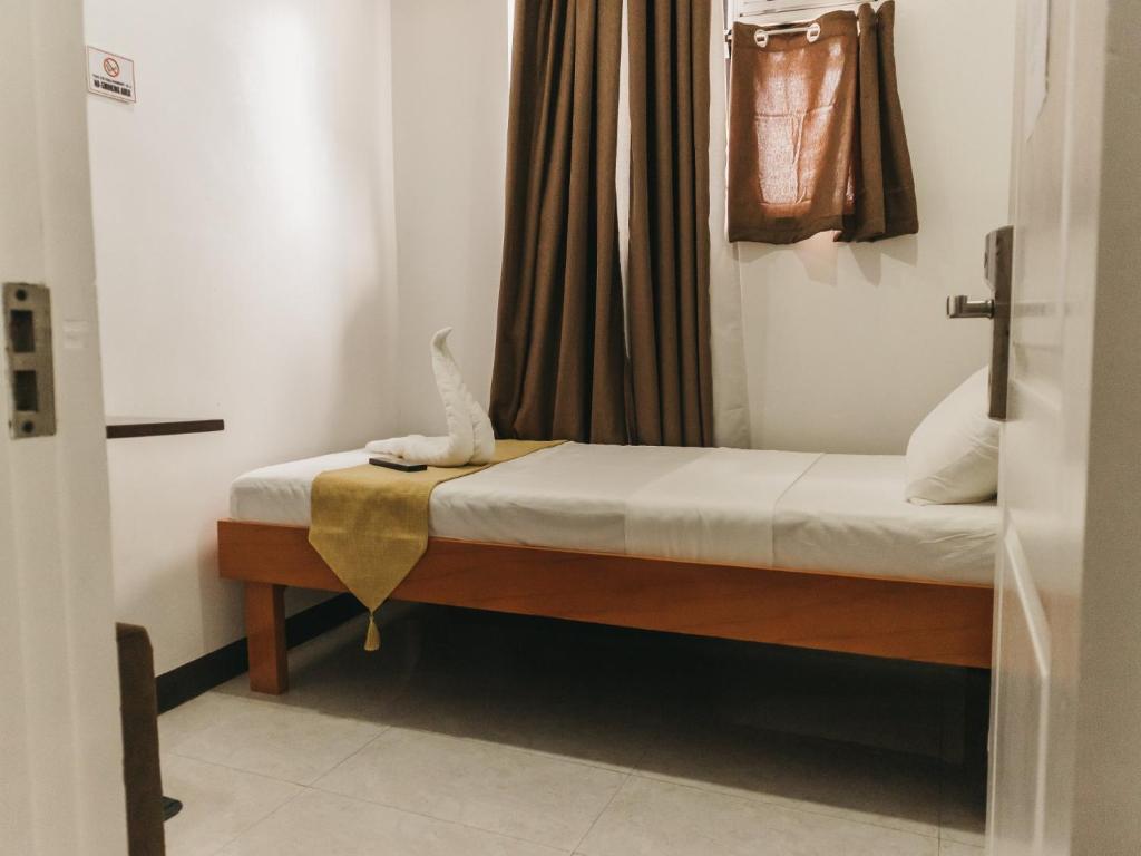 Postel nebo postele na pokoji v ubytování La Choeben Suites