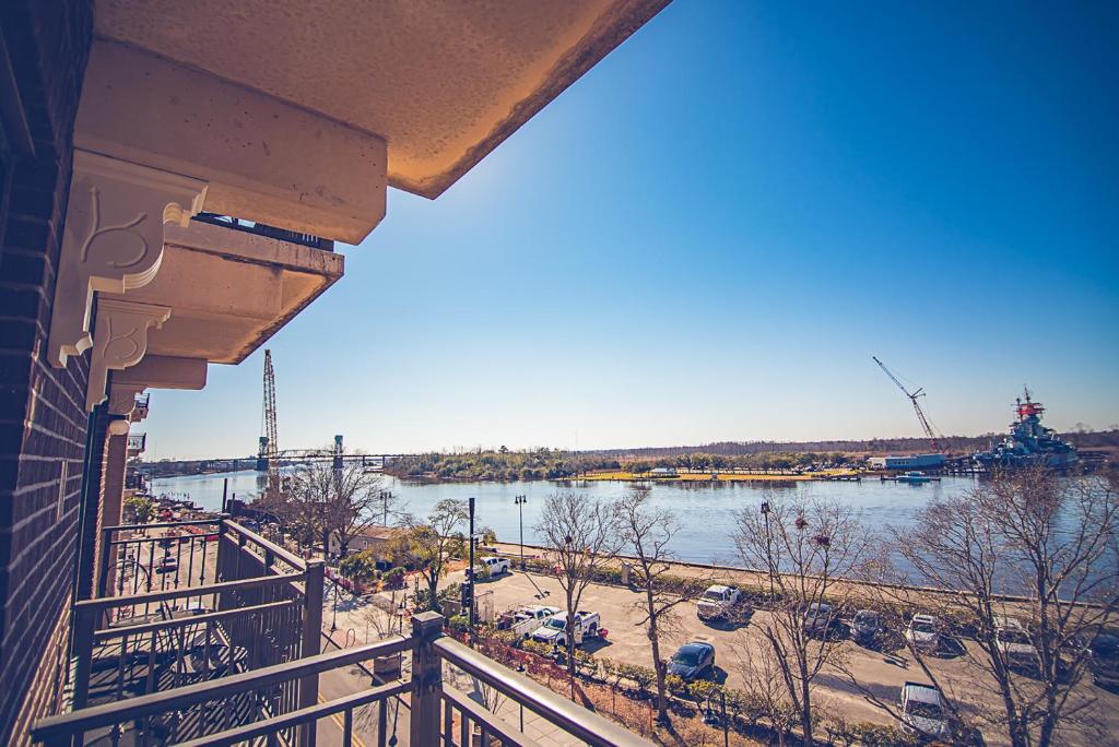 a view of a river from a balcony at Water Street Retreat 12 in Wilmington