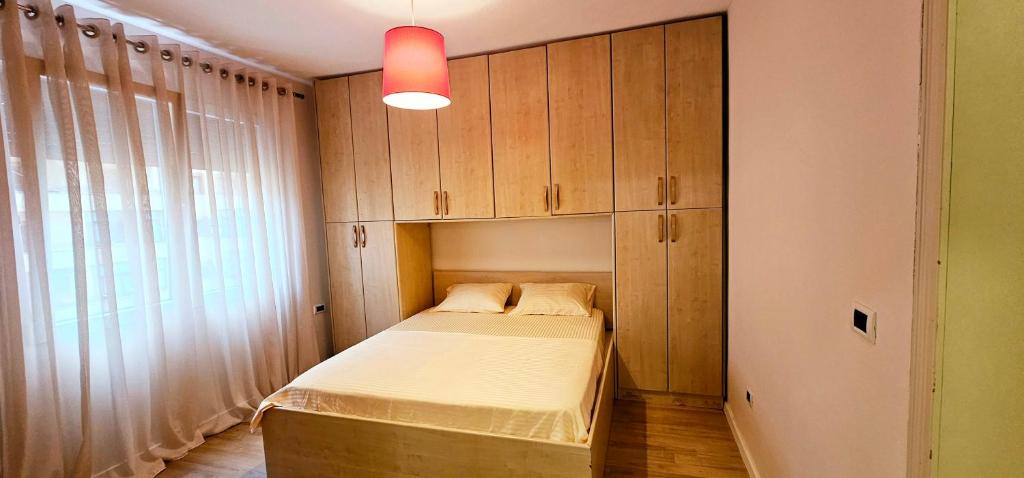 Discover Tirana from our 3-room apartment with free parking-Komuna e Parisit - Image 6