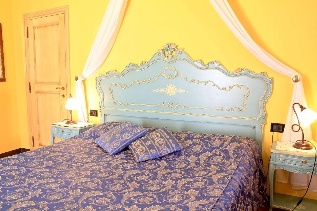 Postel nebo postele na pokoji v ubytování La Terrazza Di Montepulciano