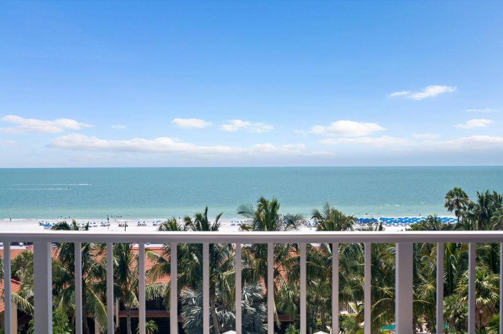 a view of the beach from a balcony at Marco Beach Ocean Suites in Marco Island