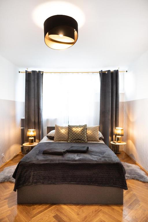 Posteľ alebo postele v izbe v ubytovaní ClickTheFlat Pereca City Centre Apart Rooms