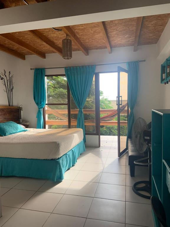Postel nebo postele na pokoji v ubytování Hotel Nantu Hostería