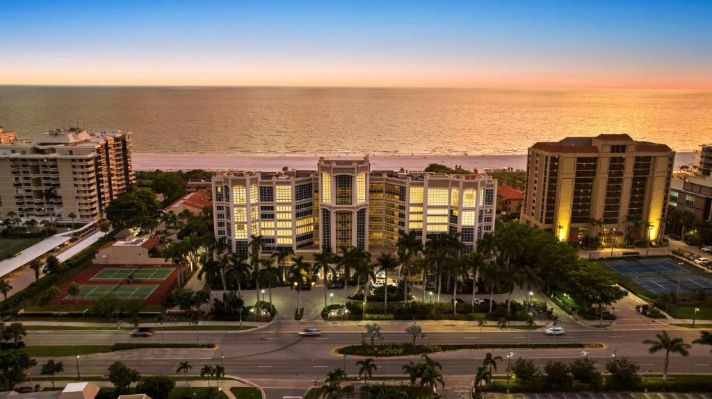 an aerial view of a city with the ocean at Marco Beach Ocean Suites in Marco Island