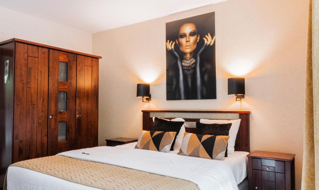 Postel nebo postele na pokoji v ubytování Turnhout City Hotel