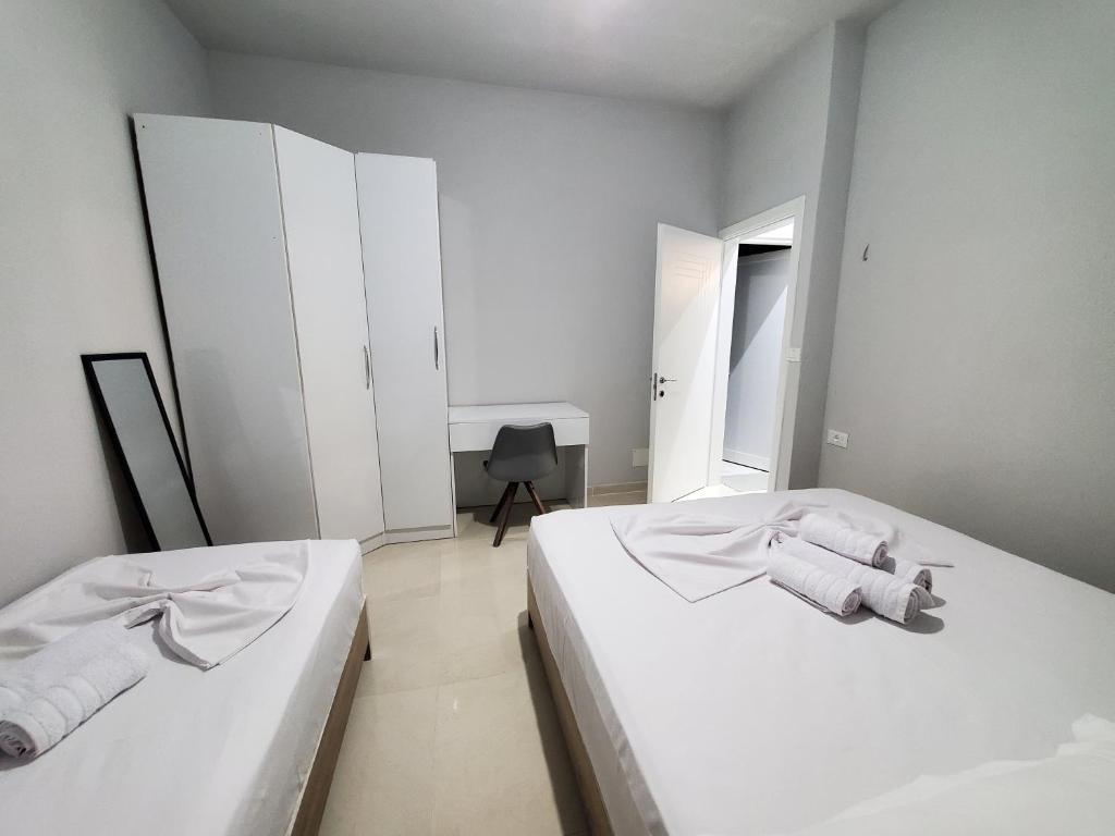Postel nebo postele na pokoji v ubytování Twins Apartment
