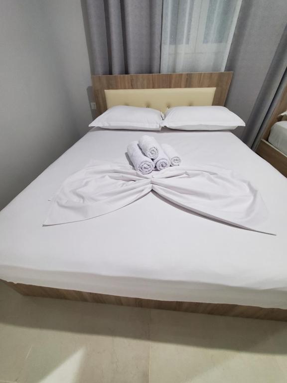 Postel nebo postele na pokoji v ubytování Twins Apartment
