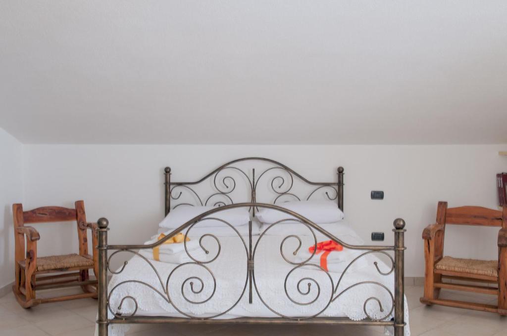 Postel nebo postele na pokoji v ubytování B&B Le Fresie