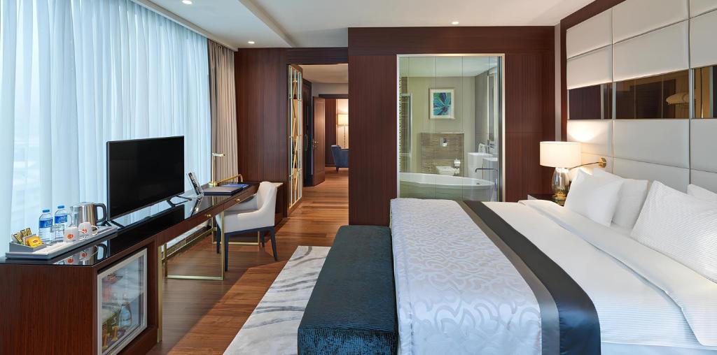 Cama ou camas em um quarto em Elite World Grand Istanbul Basın Ekspres