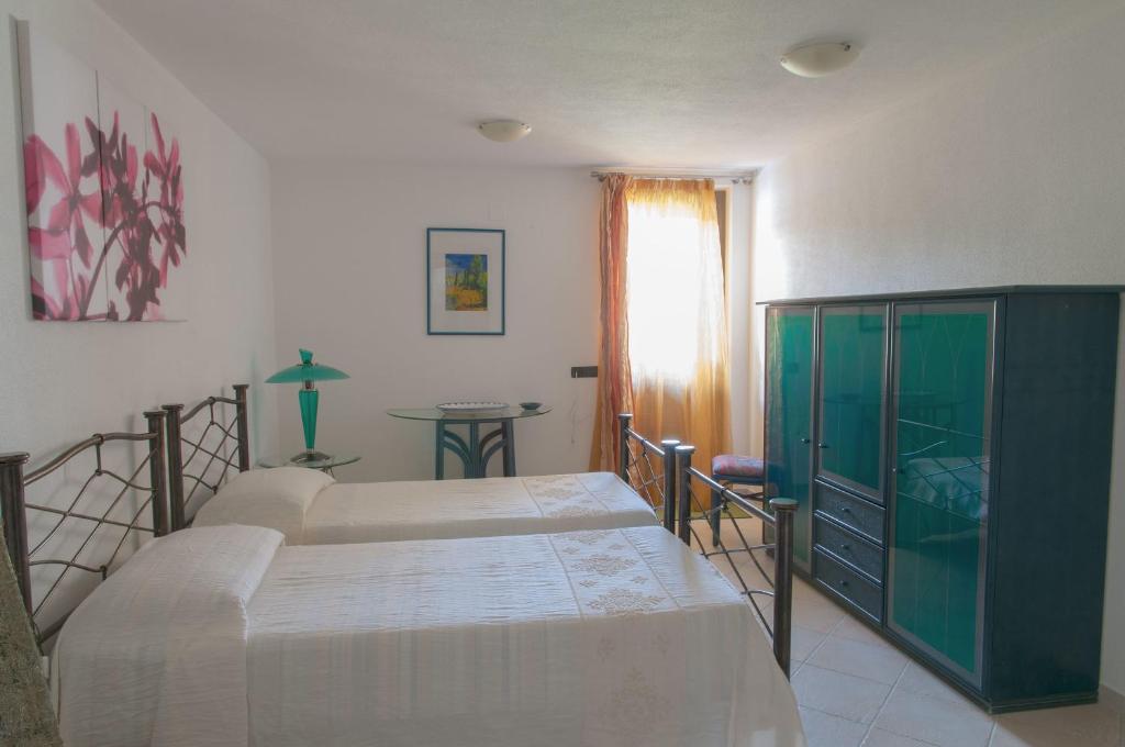 Postel nebo postele na pokoji v ubytování B&B Le Fresie