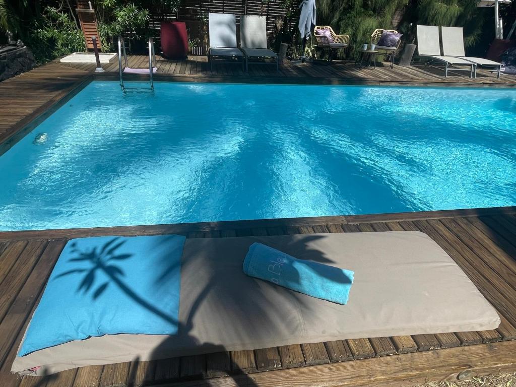 Piscina en o cerca de LA MAISON DES PALMES