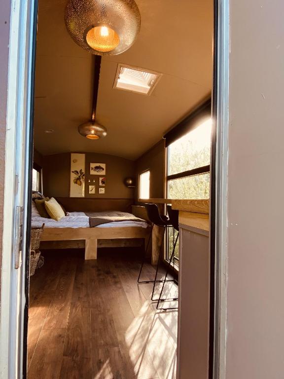 Voodi või voodid majutusasutuse Krusmølle Glamping toas
