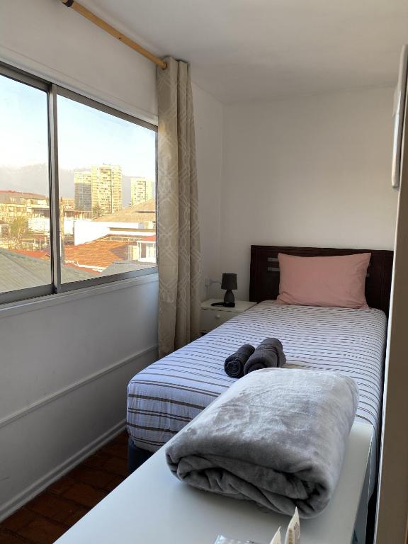 Postel nebo postele na pokoji v ubytování Mondrian Santiago