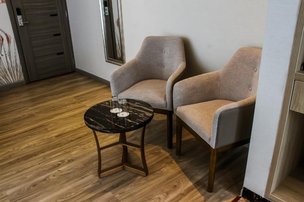 Χώρος καθιστικού στο Gold Source Hotel
