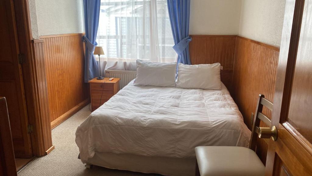 Postel nebo postele na pokoji v ubytování CHALET CHAPITAL Punta Arenas