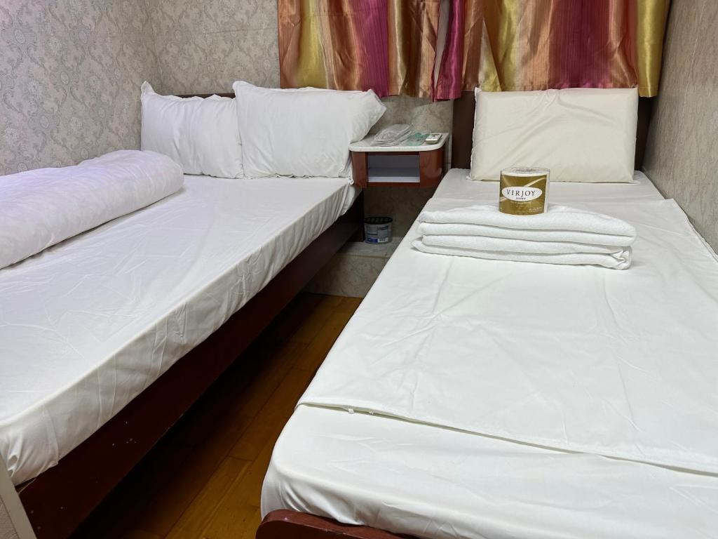 Postel nebo postele na pokoji v ubytování Piaget guest house