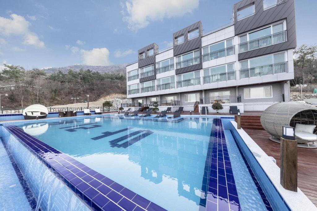 Bazén v ubytování Aria Pension & Resort nebo v jeho okolí