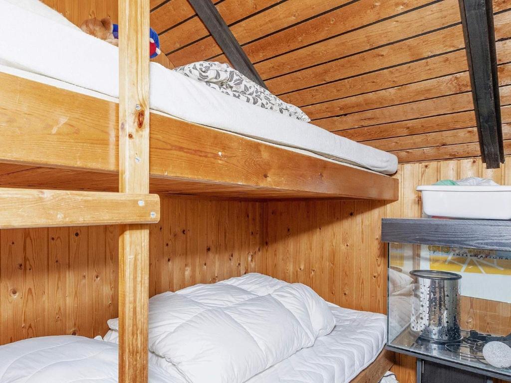 Postel nebo postele na pokoji v ubytování 8 person holiday home in Løgstør-By Traum