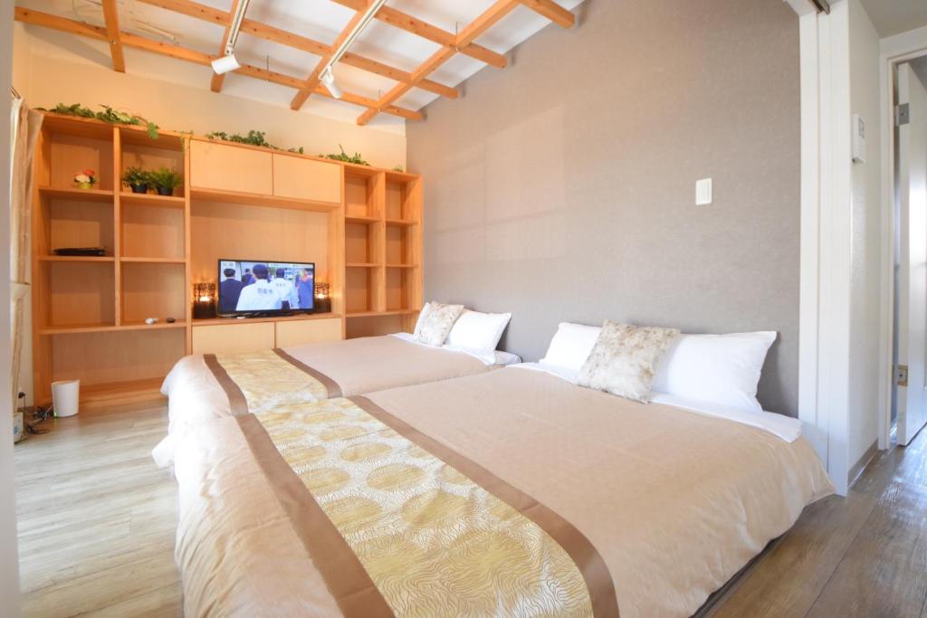 Postel nebo postele na pokoji v ubytování Comfy Stay TDS