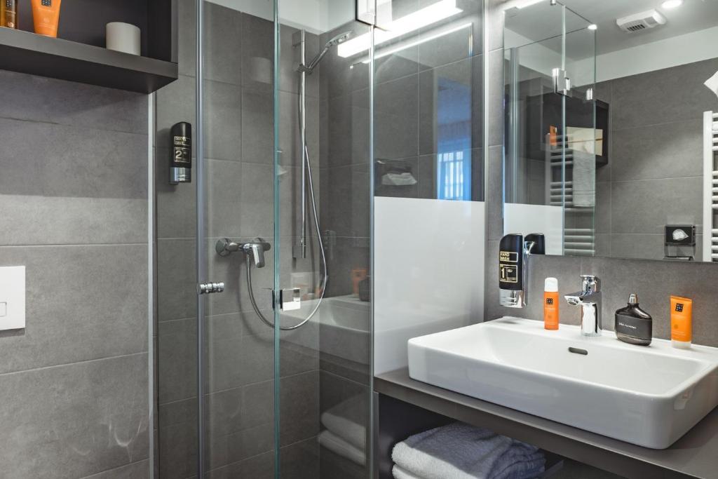 Koupelna v ubytování Oliver Apartments | contactless check-in