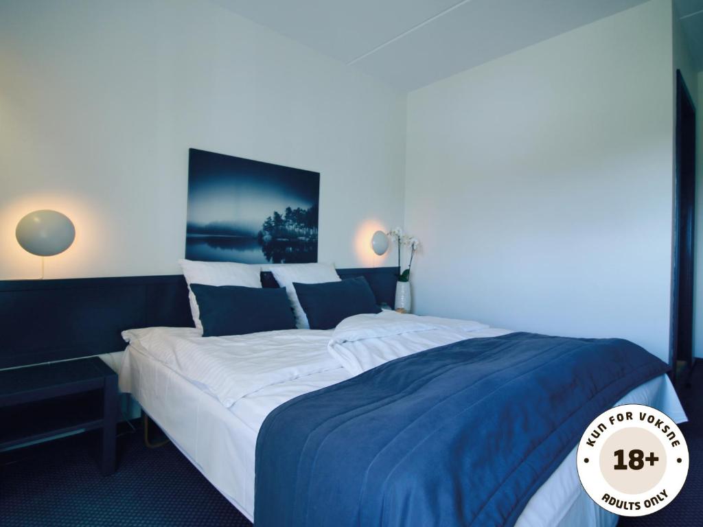 Postel nebo postele na pokoji v ubytování Ærø Hotel - Adults only