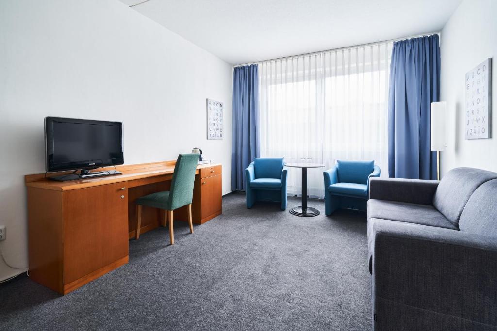 TV a/nebo společenská místnost v ubytování OREA Hotel Voro Brno