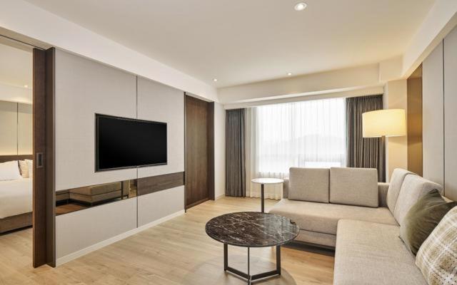 TV a/nebo společenská místnost v ubytování Hotel Interburgo Exco