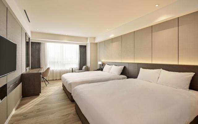 Postel nebo postele na pokoji v ubytování Hotel Interburgo Exco