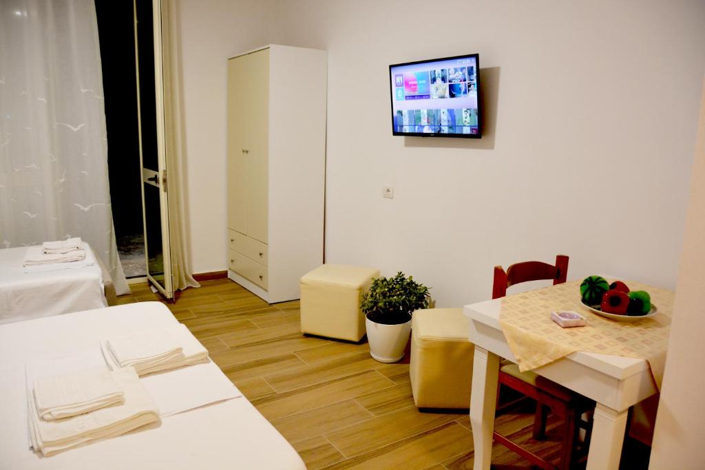 Postel nebo postele na pokoji v ubytování Mico's Apartments