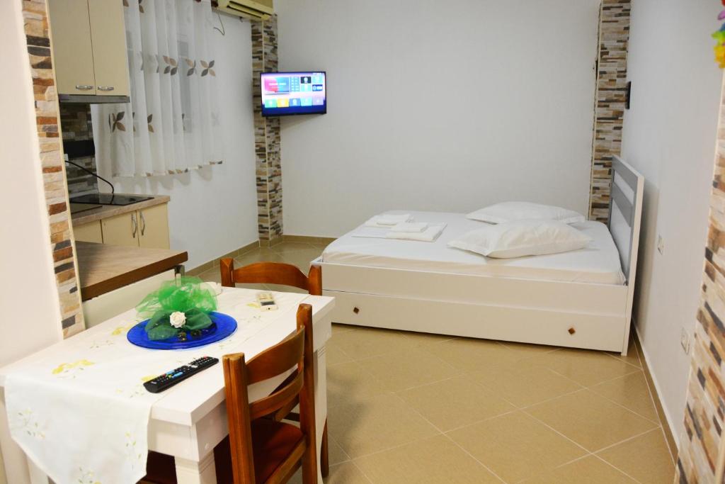 Postel nebo postele na pokoji v ubytování Mico's Apartments
