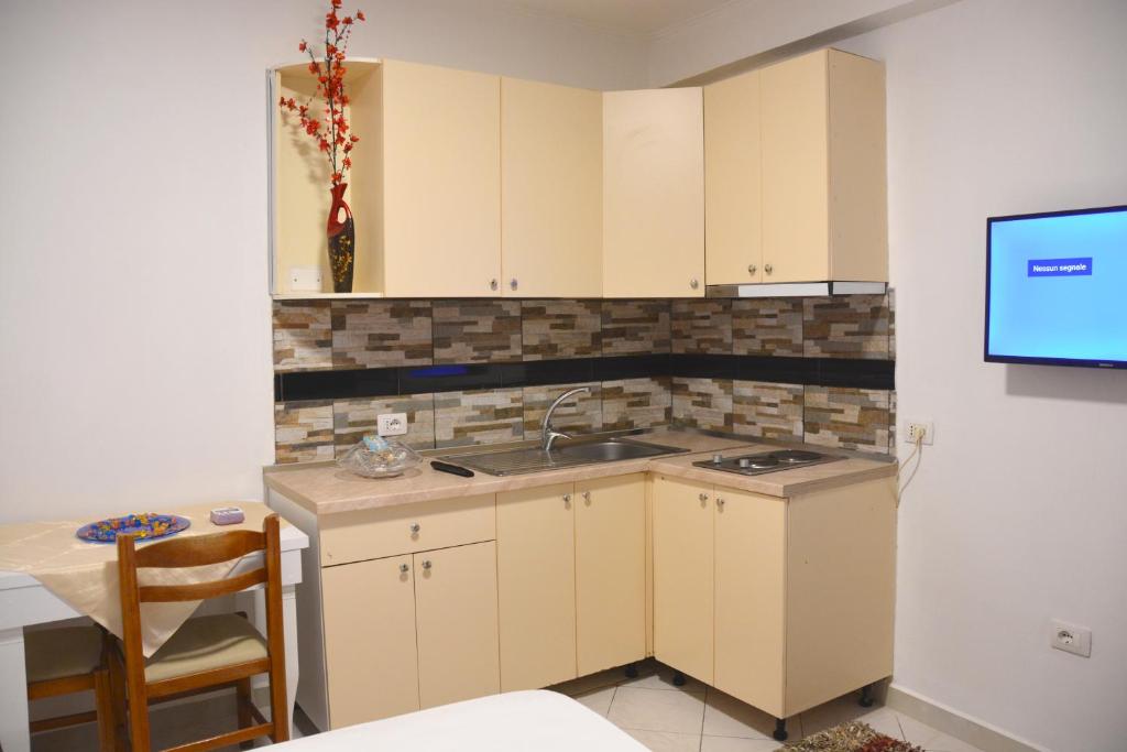 Kuchyň nebo kuchyňský kout v ubytování Mico's Apartments