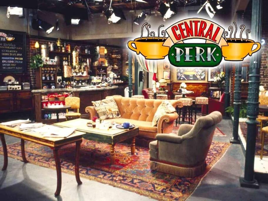 a living room with a couch and a bar at Central Perk - NEW @ Brescia in Brescia