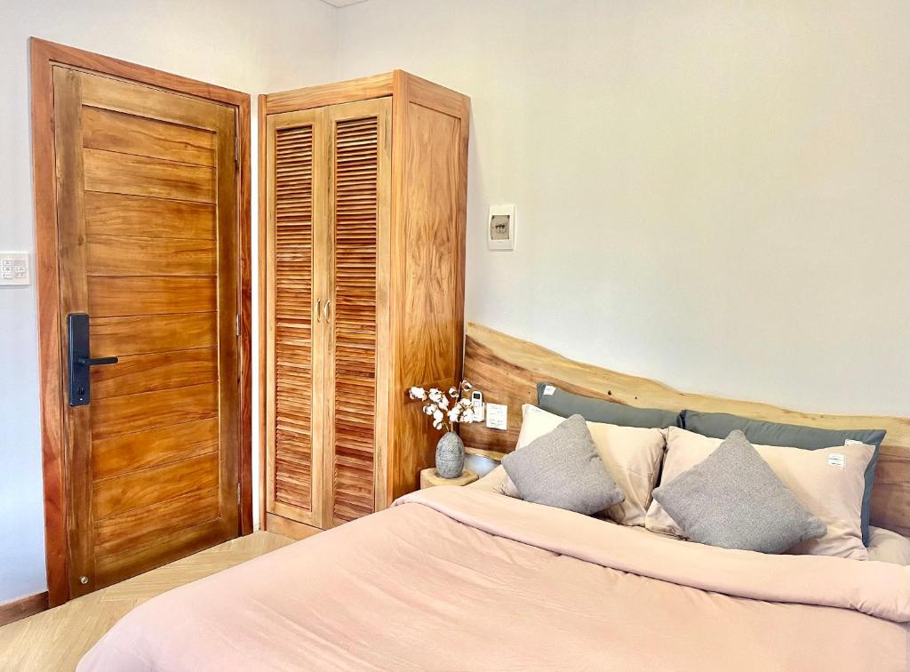 Postel nebo postele na pokoji v ubytování MIDMOST CASA