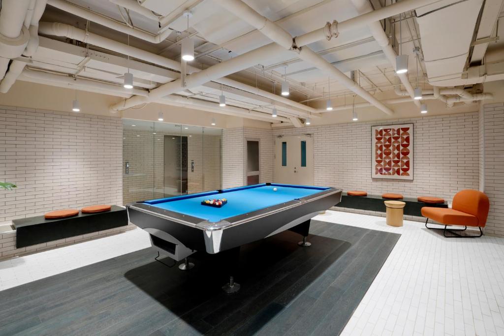 a billiard room with a pool table at base-Beijing Wangfujing Serviced Apartment- in Hutong &Bike rental &Close to Forbidden City, Tian'anmen Square &Subway nearby &Free coffee &Washing machine,Kitchen &Restaurant discount &English speaking &High speed free WiFi in Beijing