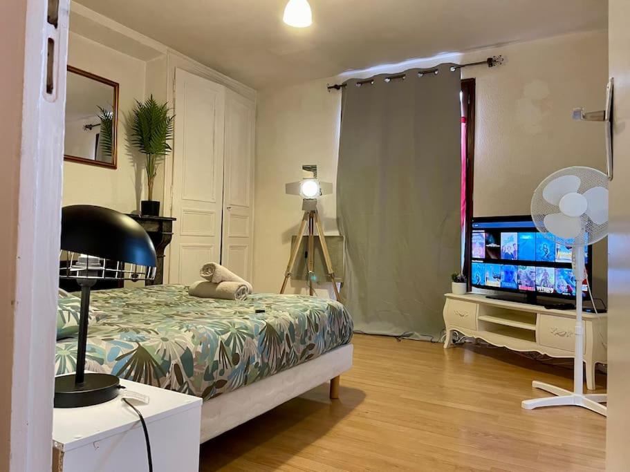 Postel nebo postele na pokoji v ubytování Appart T2 Cozy City Center