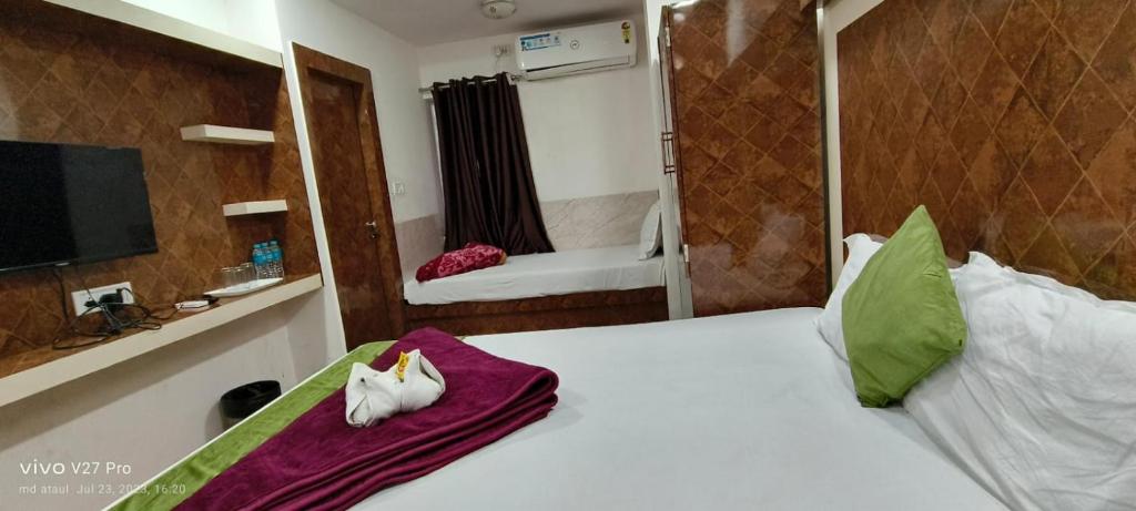 Postel nebo postele na pokoji v ubytování Hotel Best Buy