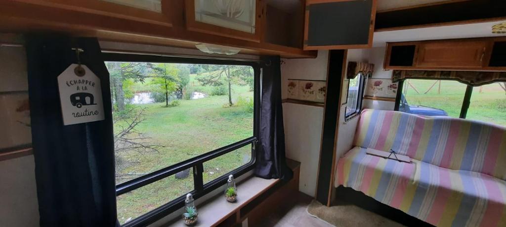 a view of a room with a window in a rv at Ranch vdv in Thetford Mines