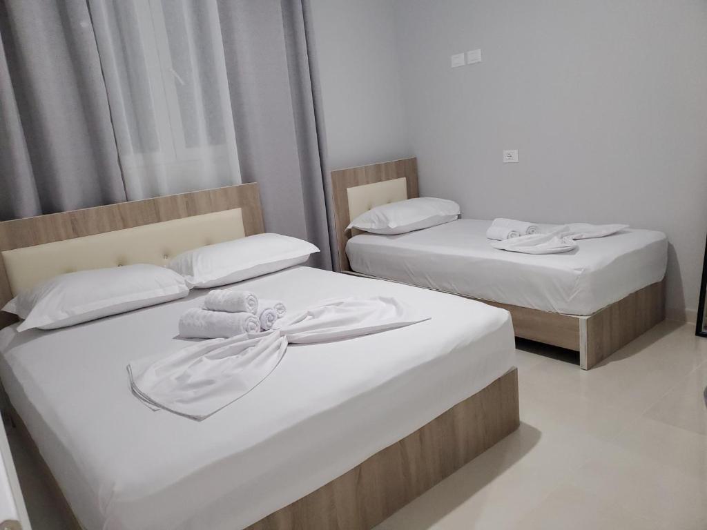 Postel nebo postele na pokoji v ubytování Twins Apartment