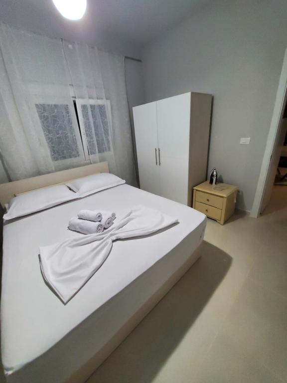 Postel nebo postele na pokoji v ubytování Twins Apartment