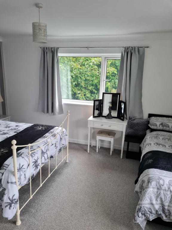 Postel nebo postele na pokoji v ubytování Richlands Homestay