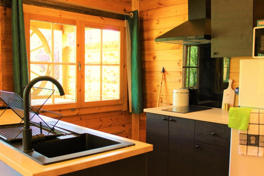 Kuchyň nebo kuchyňský kout v ubytování Chalet Estive
