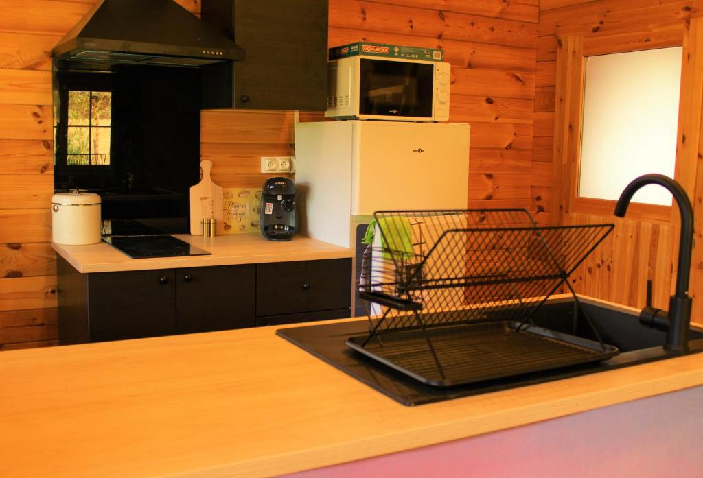 Kuchyň nebo kuchyňský kout v ubytování Chalet Estive