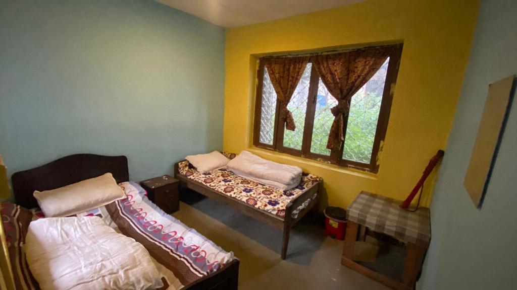 Postel nebo postele na pokoji v ubytování Happy Donkey hostel