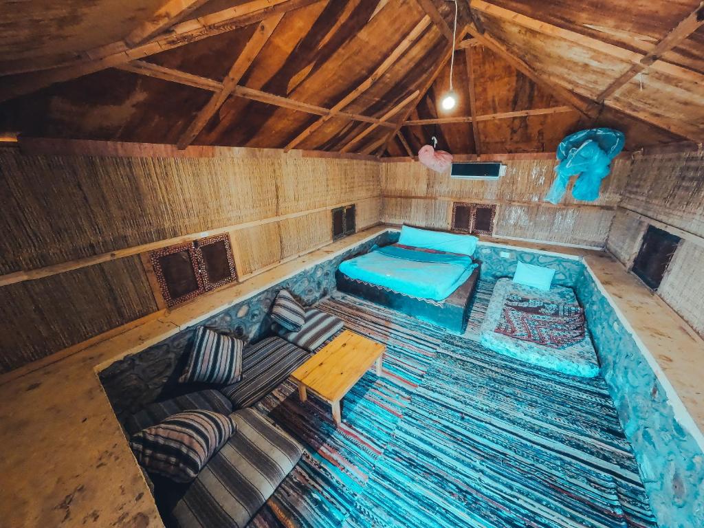 Postel nebo postele na pokoji v ubytování New Moon Island Camp